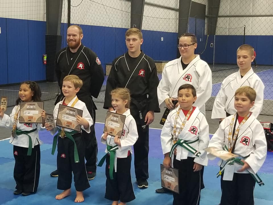 kids being promoted martial arts